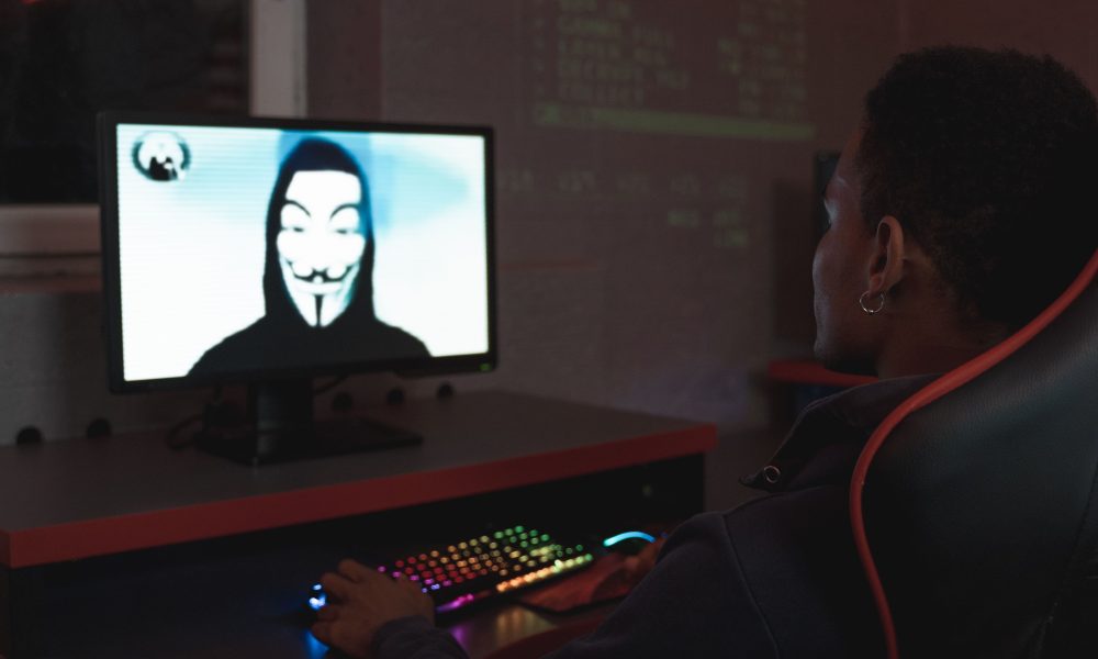 Man in black hoodie having a video call
